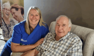 Sharon smiling with her father who is living with Parkinson's