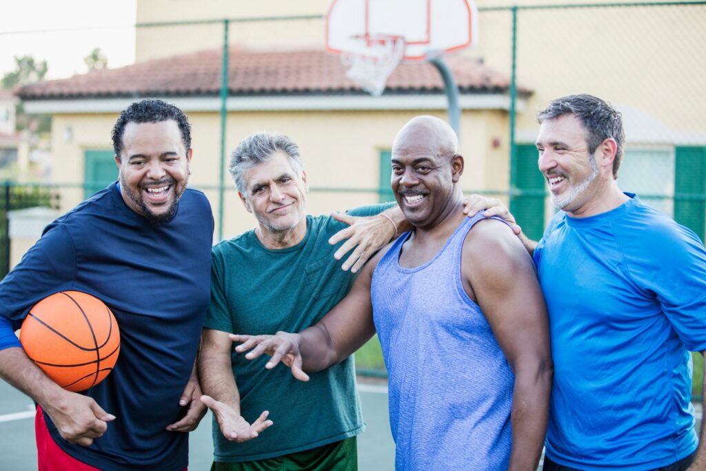 Parkinson's research hope: Group of men playing basketball