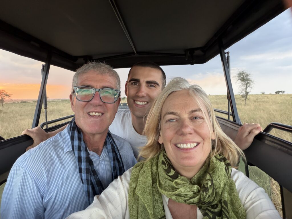 Gaby (left) and Jane (right) on Safari in Africa with their son, Marcel (middle)