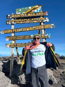 Gaby proudly sporting his Fight Parkinson’s A Walk in the Park t-shirt at the top of Mt Kilimanjaro