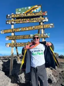 Gaby proudly sporting his Fight Parkinson’s A Walk in the Park t-shirt at the top of Mt Kilimanjaro